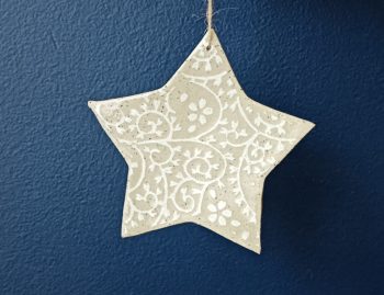 Star ornament raw clay with white swirl design